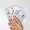 Hand Holding Euro Notes
